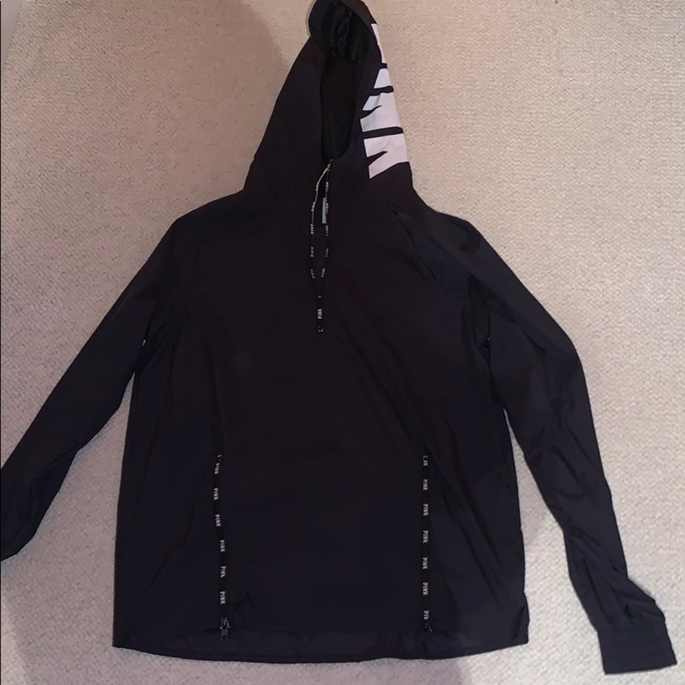 Pink windbreaker jacket.